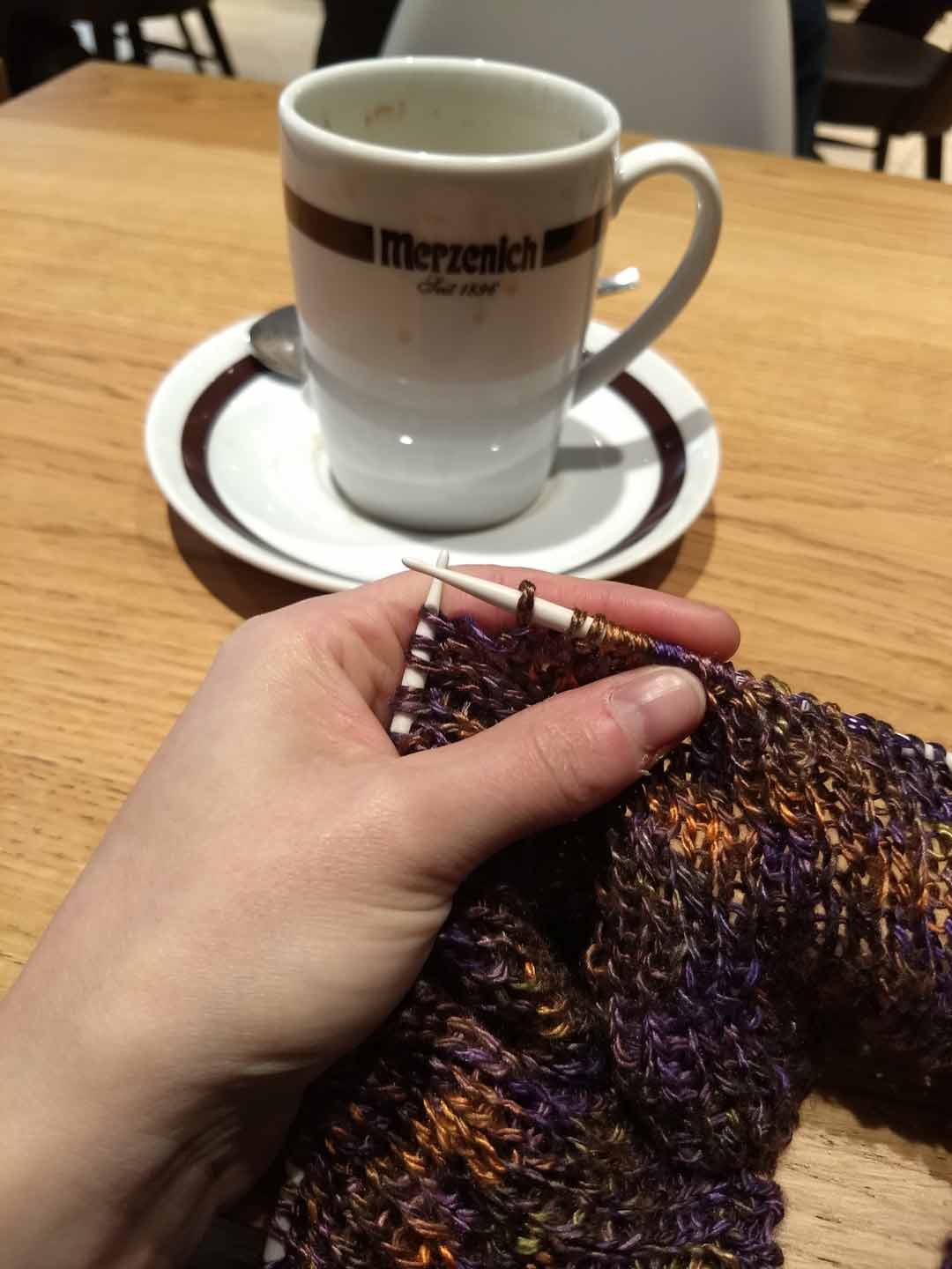 Coffee and knitting in a cafe