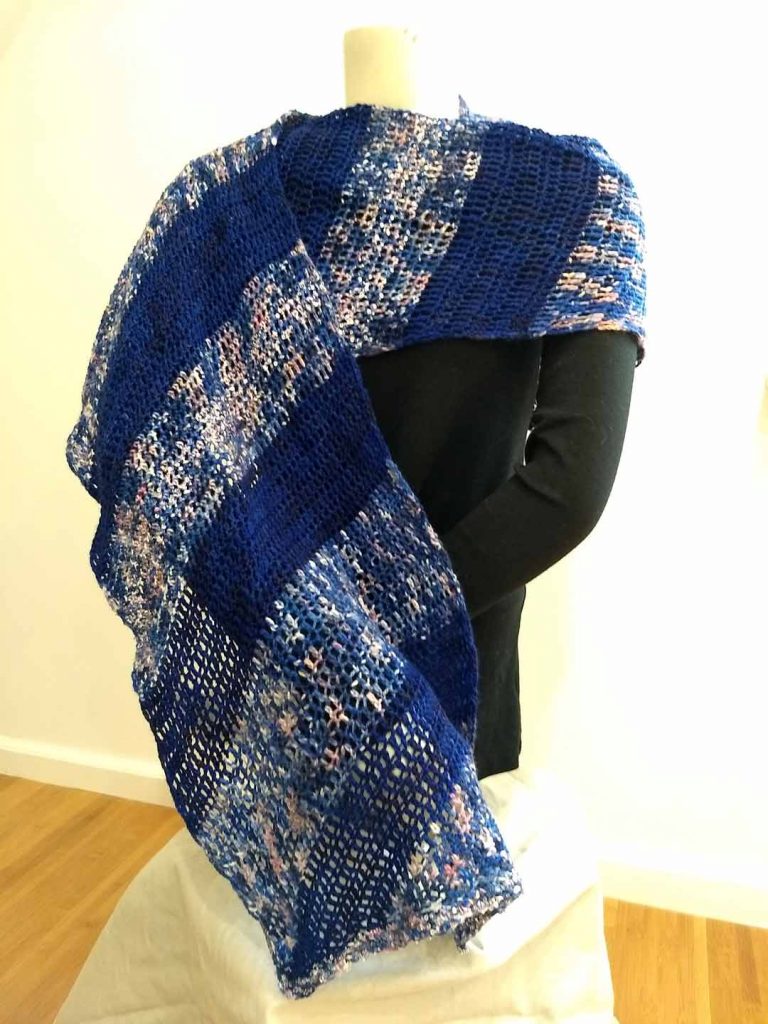 Evening Glow Wrap, shown on mannequin form displaying wings