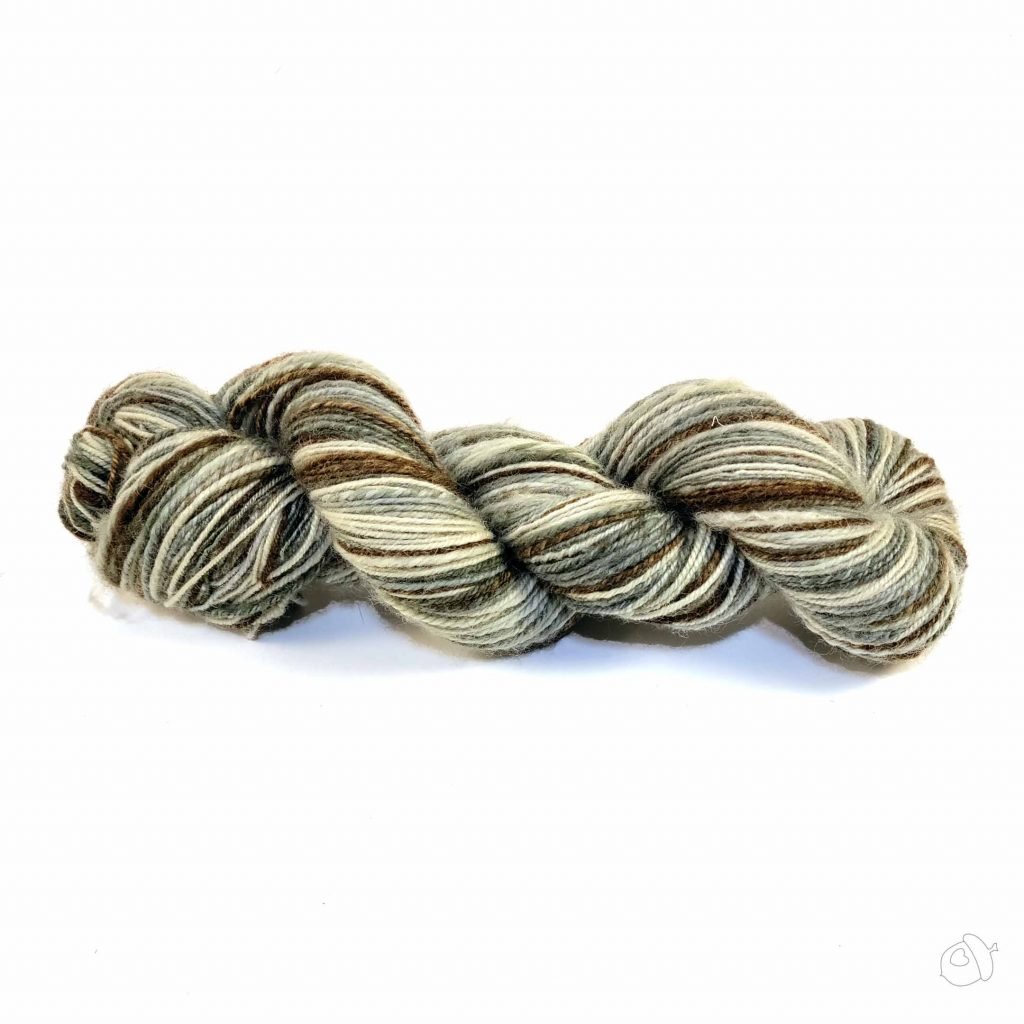 hand supn yarn in browns, ecru, and grey-green shades,