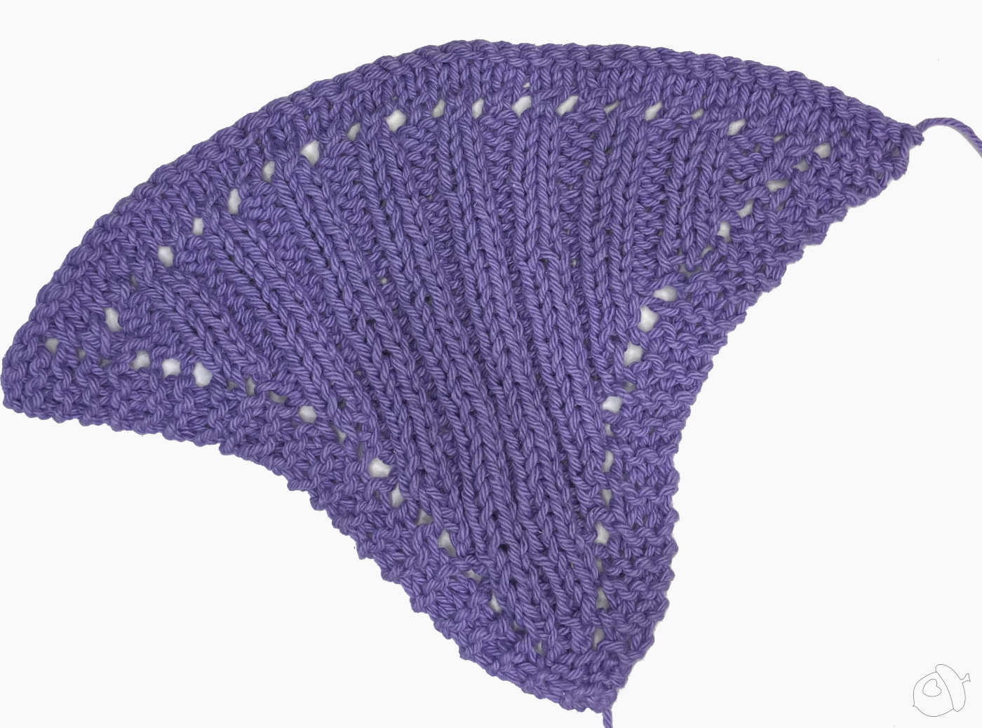 back of Scallop Shell motif in "hot purple" after blocking on white background.