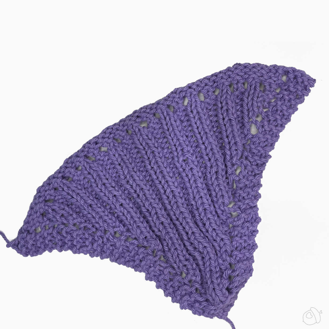 Scallop Shell motif in "hot purple" before blocking on white background.